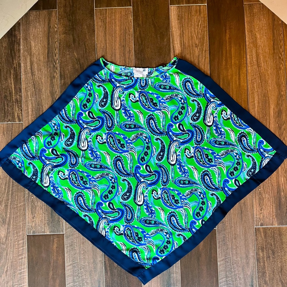 One of the kind this is a beautiful blouse you will receive tons of complements